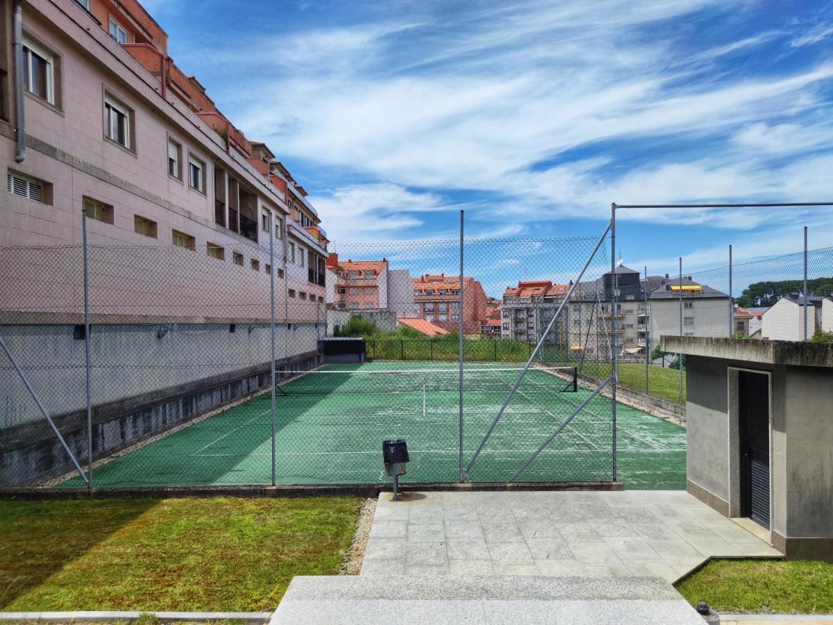 Ático con vistas, piscina y pista de tenis, a 200 metros de la playa Sanxenxo Esterno foto